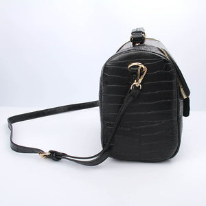 Dome Crossbody Lunchbag by INDᵊ’OPOLIS